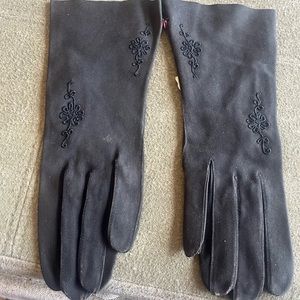 These are vintage black white women’s gloves made in France